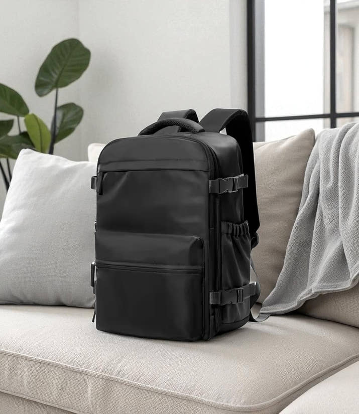 TRAVLA™ Vacuum Compression Travel Backpack