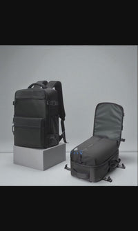TRAVLA™ Vacuum Compression Travel Backpack